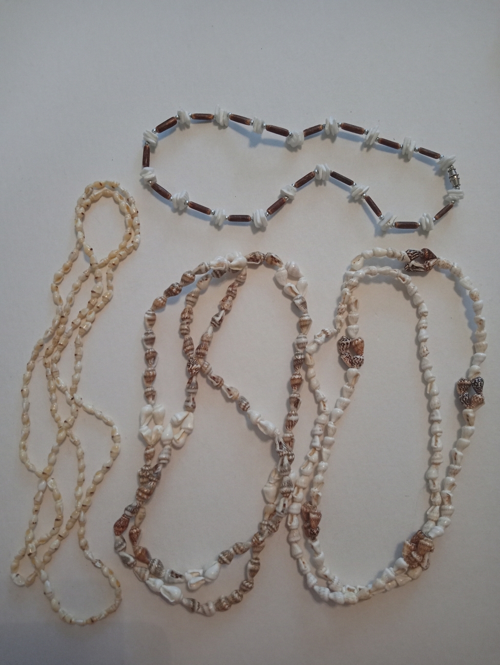 #1220. 4 Piece Assorted, Genuine Shell Necklace Bundle